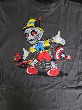 Black Short-Sleeve Graphic Tee with Colorful Pinocchio Robot Print